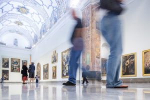 Visitors in the room V (Sevillian Baroque), Museum of Fine Arts, Seville, Spain.