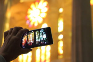 Someone photographed with a smartphone the Sagrada Familia from the inside Someone photographed with a smartphone the Sagrada Familia from the inside