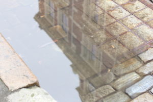House refelcted in a puddle House refelcted in a puddle