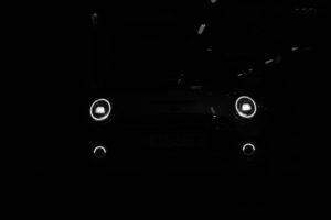 Scheinwerfer des elektrischen Mini Cooper SE Scheinwerfer des elektrischen Mini Cooper SE