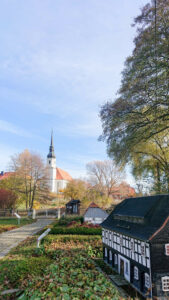 Europe, Germany, Saxony, Upper Lusatia, Cunewalde, Environment Park with a view of the village church