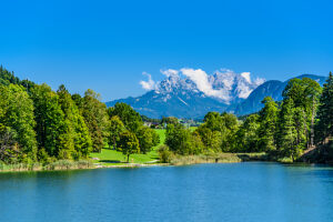 Austria, Tyrol, district Kufstein, Kramsach, Reintaler See against Kaisergebirge, view from Restaurant Fischerstube