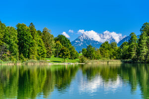 Austria, Tyrol, district Kufstein, Kramsach, Reintaler See against Kaisergebirge, view from Restaurant Fischerstube