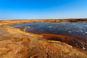 The Gaet'ale pond, also an oil pond, with hypersalin water, Dallol geothermal area, Hamadela, Danakil depression, Afar triangle, Ethiopia The Gaet'ale pond, also an oil pond, with hypersalin water, Dallol geothermal area, Hamadela, Danakil depression, Afar triangle, Ethiopia