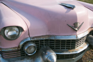 Pink Cadillac classic car in front of restaurant in Virgina, USA, old, rusty Pink Cadillac classic car in front of restaurant in Virgina, USA, old, rusty