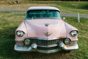 Pink Cadillac classic car in front of restaurant in Virgina, USA, old, rusty Pink Cadillac classic car in front of restaurant in Virgina, USA, old, rusty