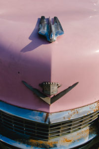 Pink Cadillac classic car in front of restaurant in Virgina, USA, old, rusty Pink Cadillac classic car in front of restaurant in Virgina, USA, old, rusty