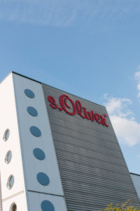 Headquarters of the s.Oliver fashion manufacturer in Rottendorf near Würzburg Logo Headquarters of the s.Oliver fashion manufacturer in Rottendorf near Würzburg Logo
