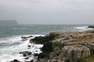 Landscape in Scotland's highlands cliff with crashing waves Landscape in Scotland's highlands cliff with crashing waves