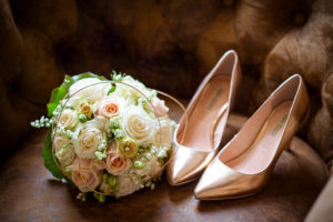 Detail view, wedding, bridal bouquet and bridal shoes Detail view, wedding, bridal bouquet and bridal shoes