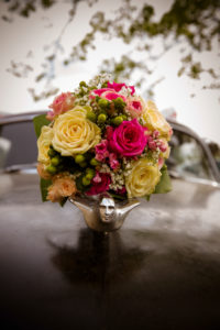 Detail, wedding, bridal bouquet on vintage car cooler Detail, wedding, bridal bouquet on vintage car cooler
