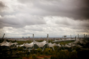 Aerial view from the Olympic Park over the Olympic Stadium / tent roof in Munich Aerial view from the Olympic Park over the Olympic Stadium / tent roof in Munich