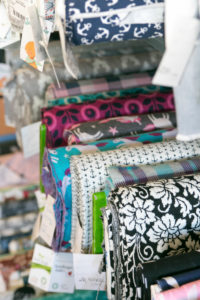 Detail of fabrics at a sewing workshop Detail of fabrics at a sewing workshop