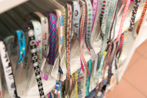 Detail of fabrics and ribbons at a sewing workshop Detail of fabrics and ribbons at a sewing workshop