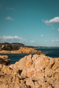 Rocks, cliffs, bay near Orosei in Sardinia with pine trees and blue sea Rocks, cliffs, bay near Orosei in Sardinia with pine trees and blue sea