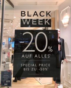 Black Friday poster on shop front in Stachus Passagen Munich Black Friday poster on shop front in Stachus Passagen Munich