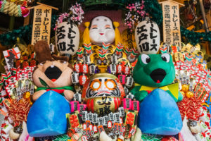 Japan, Honshu, Tokyo, Taito-ku, Otori Shrine, Decorative Good Luck Rakes called Kumade for Sale at the Tori-no-Ichi Festival held Annually in November Japan, Honshu, Tokyo, Taito-ku, Otori Shrine, Decorative Good Luck Rakes called Kumade for Sale at the Tori-no-Ichi Festival held Annually in November