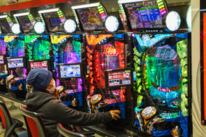 Japan, Honshu, Tokyo, Pachinko Parlour, Interior View of Single Man Playing Pachinko Japan, Honshu, Tokyo, Pachinko Parlour, Interior View of Single Man Playing Pachinko