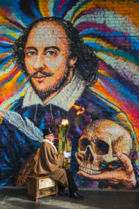 England, London, Southwark, Clink Street, Busker Playing Tuba in Front of Shakespeare Wall Art England, London, Southwark, Clink Street, Busker Playing Tuba in Front of Shakespeare Wall Art