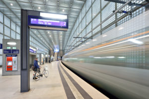 Germany, Saxony, Leipzig, City Tunnel Leipzig, station 'Wilhelm-Leuschner-Platz', arriving city train, bulb exposure, light traces, scoreboard
