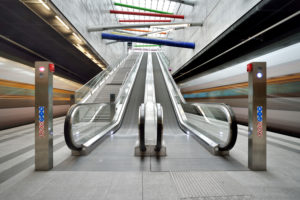 Germany, Saxony, Leipzig, City Tunnel Leipzig, station Bayerischer Bahnhof, escalators, moving S-Bahn trains, bulb exposure, light traces