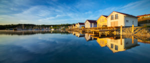 Germany, Saxony-Anhalt, Müuellen, cottages at Geiseltalsee in the morning light, Marina Müuellen