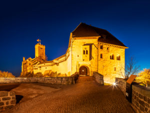 The illuminated Wartburg at dusk, UNESCO World Heritage Site, Eisenach, Thuringia, Germany