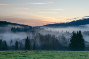 Autumnal evening mood with fog in the valley of the Bavarian Forest National Park close to Frauenau. Autumnal evening mood with fog in the valley of the Bavarian Forest National Park close to Frauenau.