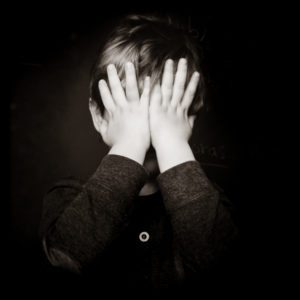 Smart Portrait of a Three Year old Toddler, Playing Peekaboo,