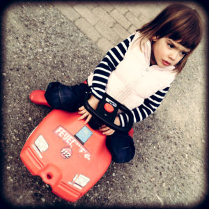 Baden-Wuerttemberg, girl with fire truck