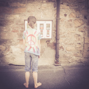 Girl at gumball machine