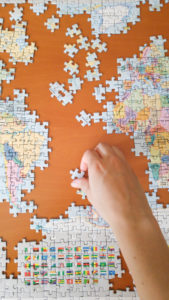 Riding a world map puzzle