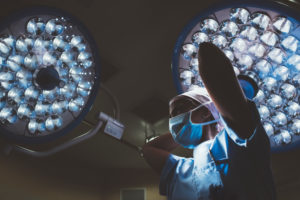 Operating room nurse getting ready for a surgery
