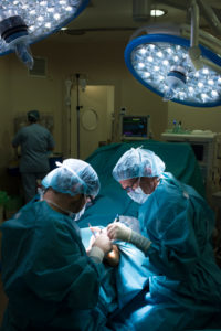 Surgeons during a foot surgery