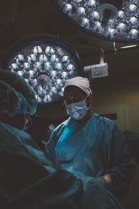 Surgeon and nurse during a surgery
