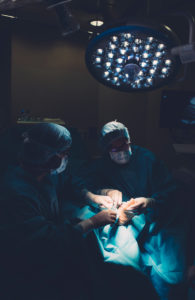 Surgeons during a foot surgery