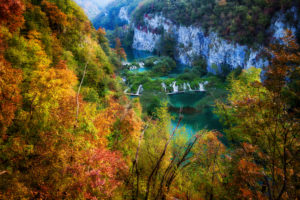 Croatia, Scenic view of lake surrounded by autumn forest in†Plitvice†Lakes National Park Croatia, Scenic view of lake surrounded by autumn forest in†Plitvice†Lakes National Park