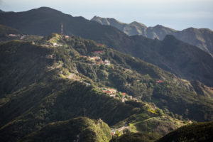 View from the Mirador Pico del Ingles to the Anaga Mountains with scattered houses and the TF-12 mountain road along the ridge, Tenerife, Canary Islands, Spain View from the Mirador Pico del Ingles to the Anaga Mountains with scattered houses and the TF-12 mountain road along the ridge, Tenerife, Canary Islands, Spain