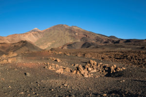 Volcanic landscape with a view of the volcanoes Pico del Teide (3718 m) and Pico Viejo (3135 m), El Teide National Park, UNESCO World Heritage, Tenerife, Canary Islands, Spain Volcanic landscape with a view of the volcanoes Pico del Teide (3718 m) and Pico Viejo (3135 m), El Teide National Park, UNESCO World Heritage, Tenerife, Canary Islands, Spain