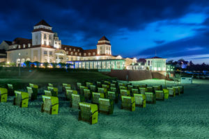 Binz, Mecklenburg-Western Pomerania, Germany, view to the pier and the health resort house with beach in the dusk Binz, Mecklenburg-Western Pomerania, Germany, view to the pier and the health resort house with beach in the dusk