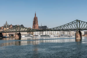 Frankfurt am Main, Hesse, Germany. Eiserner Steg with the old town and Frankfurt Cathedral. Frankfurt am Main, Hesse, Germany. Eiserner Steg with the old town and Frankfurt Cathedral.