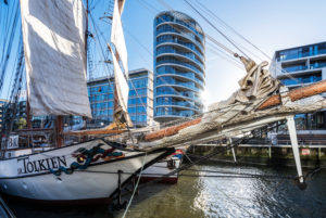 Historic ships and sailors in the traditional ship harbor, Hafencity, Hamburg, Germany Historic ships and sailors in the traditional ship harbor, Hafencity, Hamburg, Germany