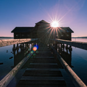 Winter afternoon on the Ammersee / Lake Ammer, Germany, Bavaria, footbridge, shipping stage, boat house, sun, backlight Winter afternoon on the Ammersee / Lake Ammer, Germany, Bavaria, footbridge, shipping stage, boat house, sun, backlight