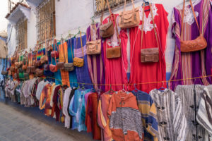 Sales booth in a blue alley in Chefchaouen, Morocco, North Africa, Africa Sales booth in a blue alley in Chefchaouen, Morocco, North Africa, Africa