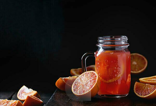 Fresh citrus fruits tangerines, oranges close-up on cotton mesh bag, rustic  style Stock Photo - Alamy