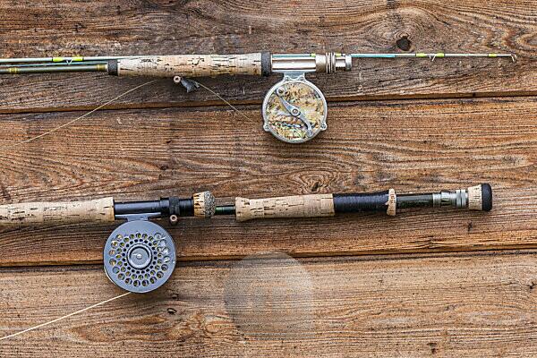 Bildagentur | mauritius images | Fishing poles on cabin wall at fishing  camp on the Alagnak River, Alaska