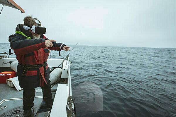 One Fishing Rod Hanging Off A Pier Photograph by Cavan Images - Pixels