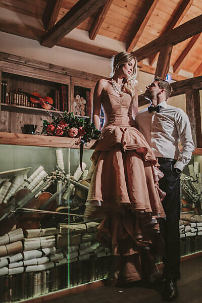 Bridal couple, music room, standing, sitting, eye contact,