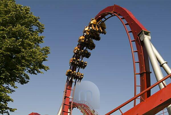 Bildagentur mauritius images Roller coaster loop from below