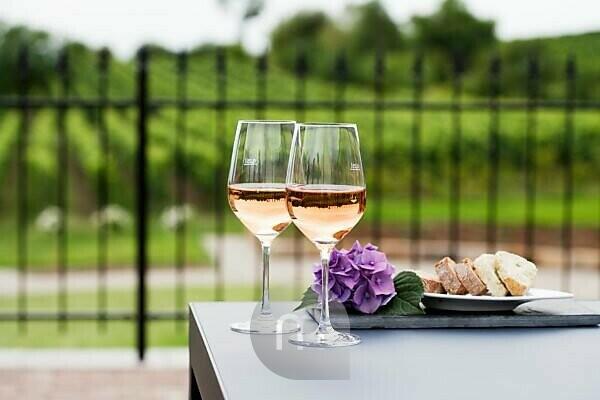 Glasses Of White Wine On Table by Foodcollection Rf